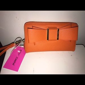 Betsey Johnson orange wristlet wallet